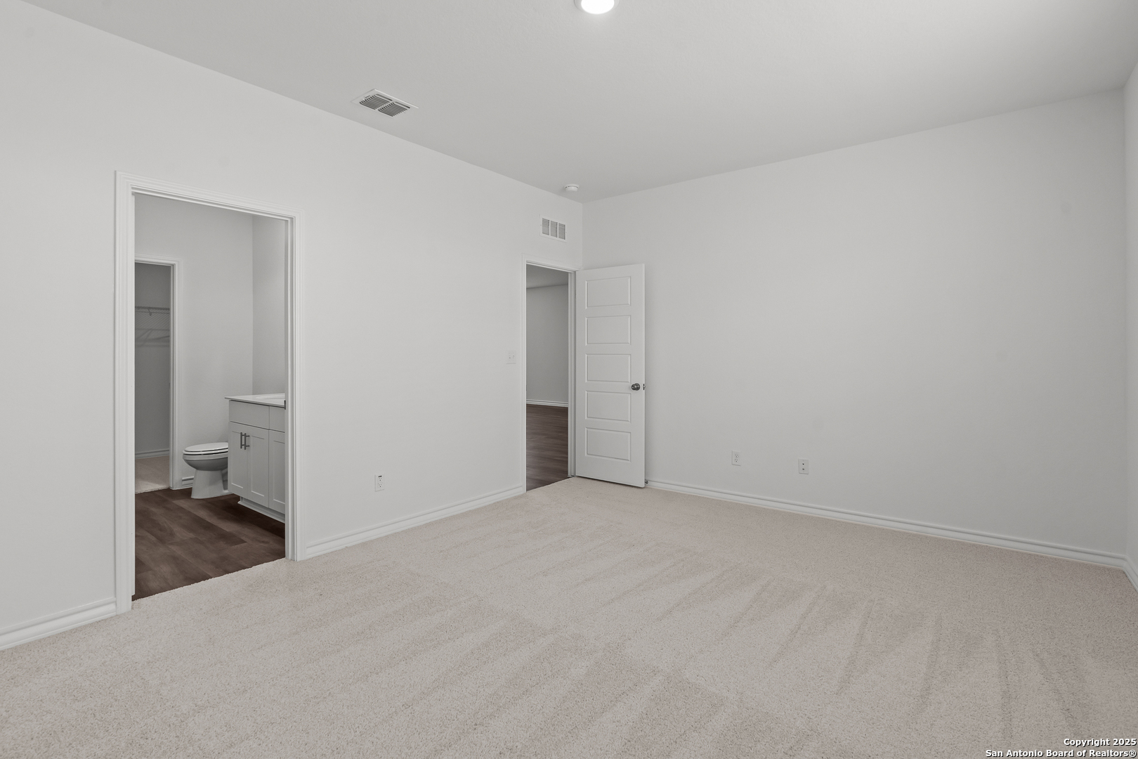 4141 Bermuda Lane Seguin, TX 78155 - Photo 15 of 28 a view of a room with a walk in closet and wooden floor