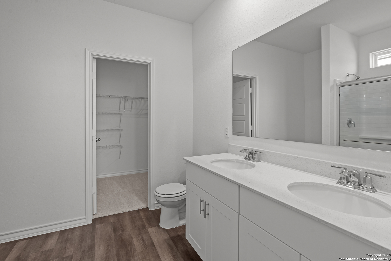 4141 Bermuda Lane Seguin, TX 78155 - Photo 16 of 28 a bathroom with a granite countertop sink and a mirror