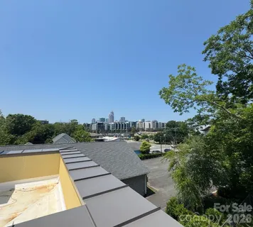 a view of swimming pool from a balcony