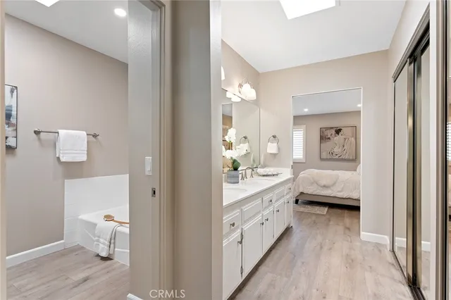 a bathroom with a bathtub and shower