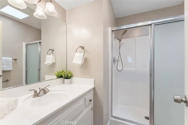 a bathroom with a sink and a vanity