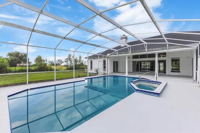 a view of a house with a swimming pool