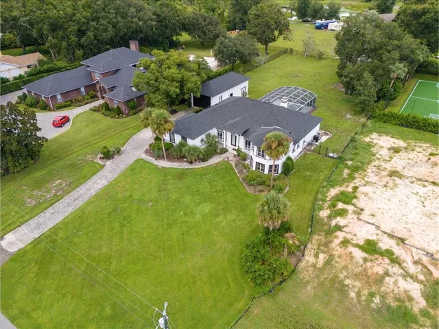 a view of an house with a swimming pool
