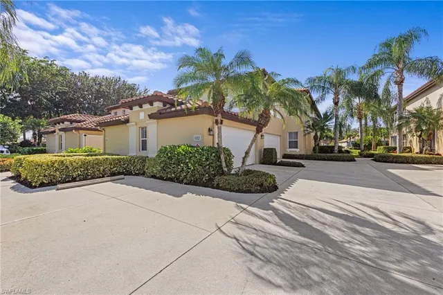 a view of a street with a building in the background