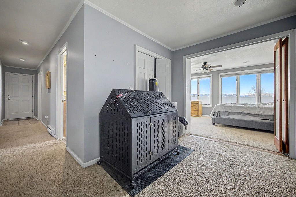 2014 East 9th Street Craig, CO 81625 - Photo 15 of 29 a view of a bedroom with furniture and windows