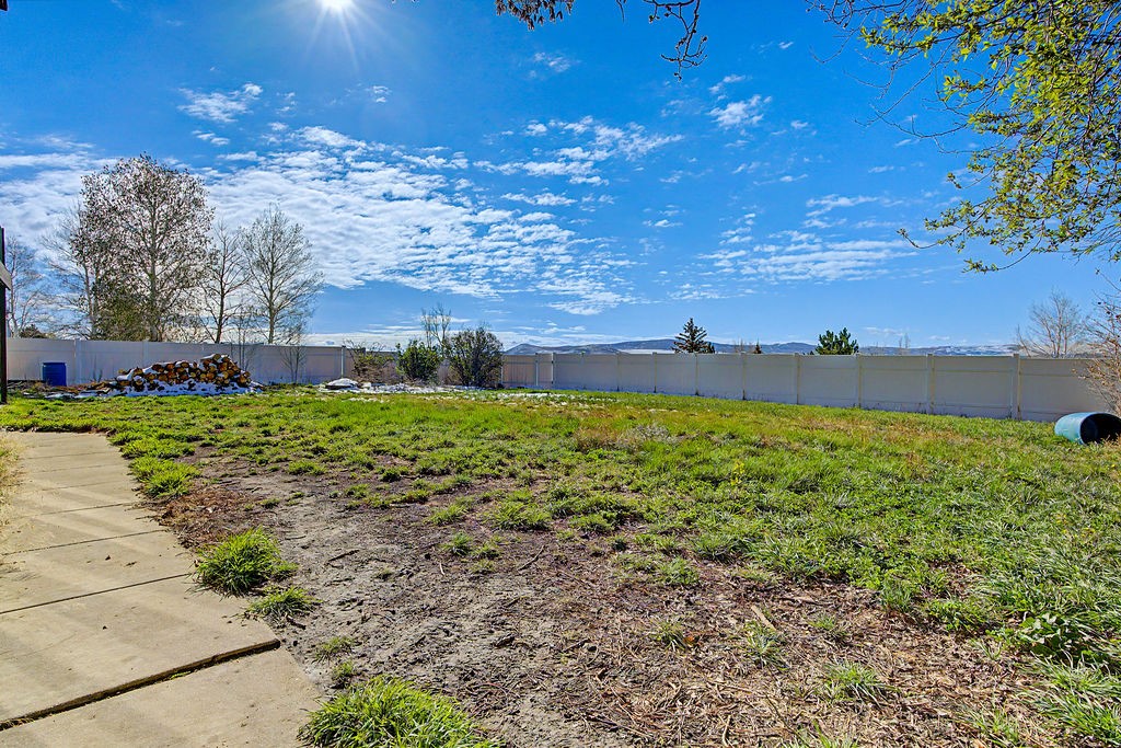 2014 East 9th Street Craig, CO 81625 - Photo 23 of 29 a view of a pathway with a yard