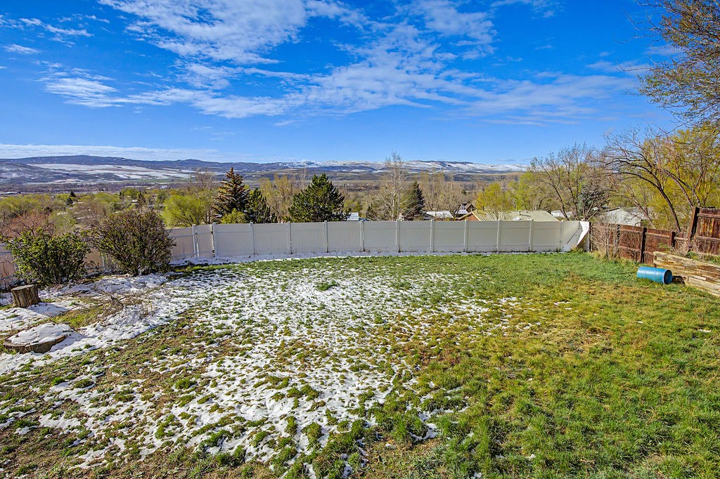 2014 East 9th Street Craig, CO 81625 - Photo 24 of 29 a view of an outdoor space and a yard