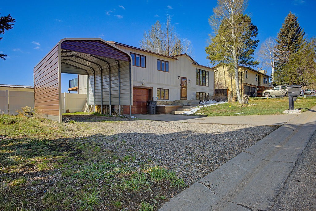 2014 East 9th Street Craig, CO 81625 - Photo 29 of 29 a front view of a house with a yard