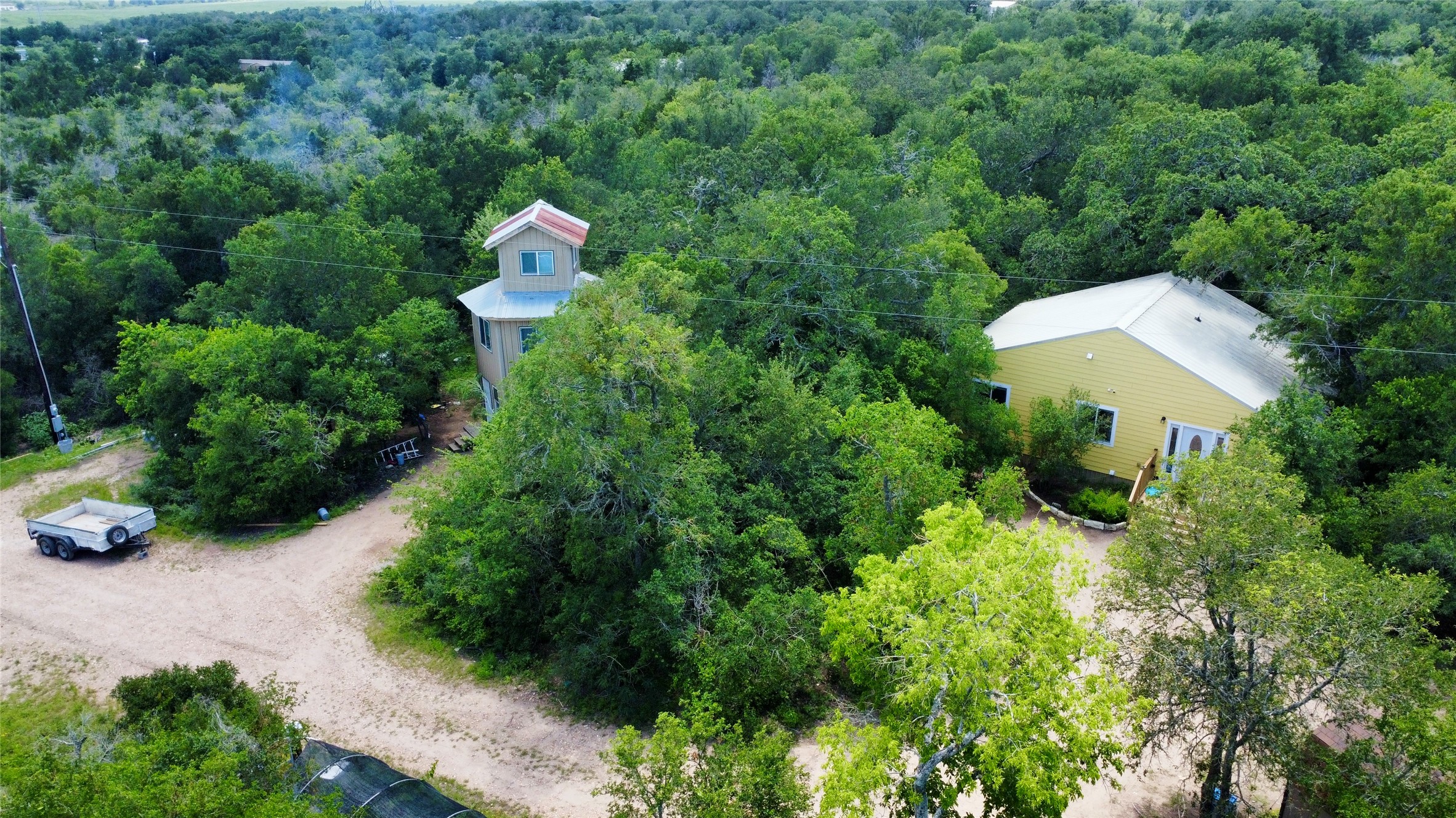 1998 Upper Elgin River Road Elgin, TX 78621 - Photo 21 of 28 an aerial view of a house with a yard and outdoor seating