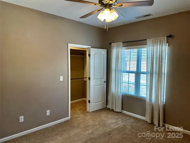 en view of an empty room with a window