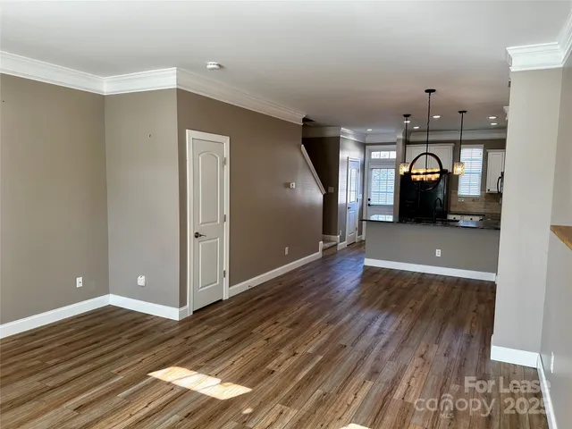 a view of a livingroom with wooden floor