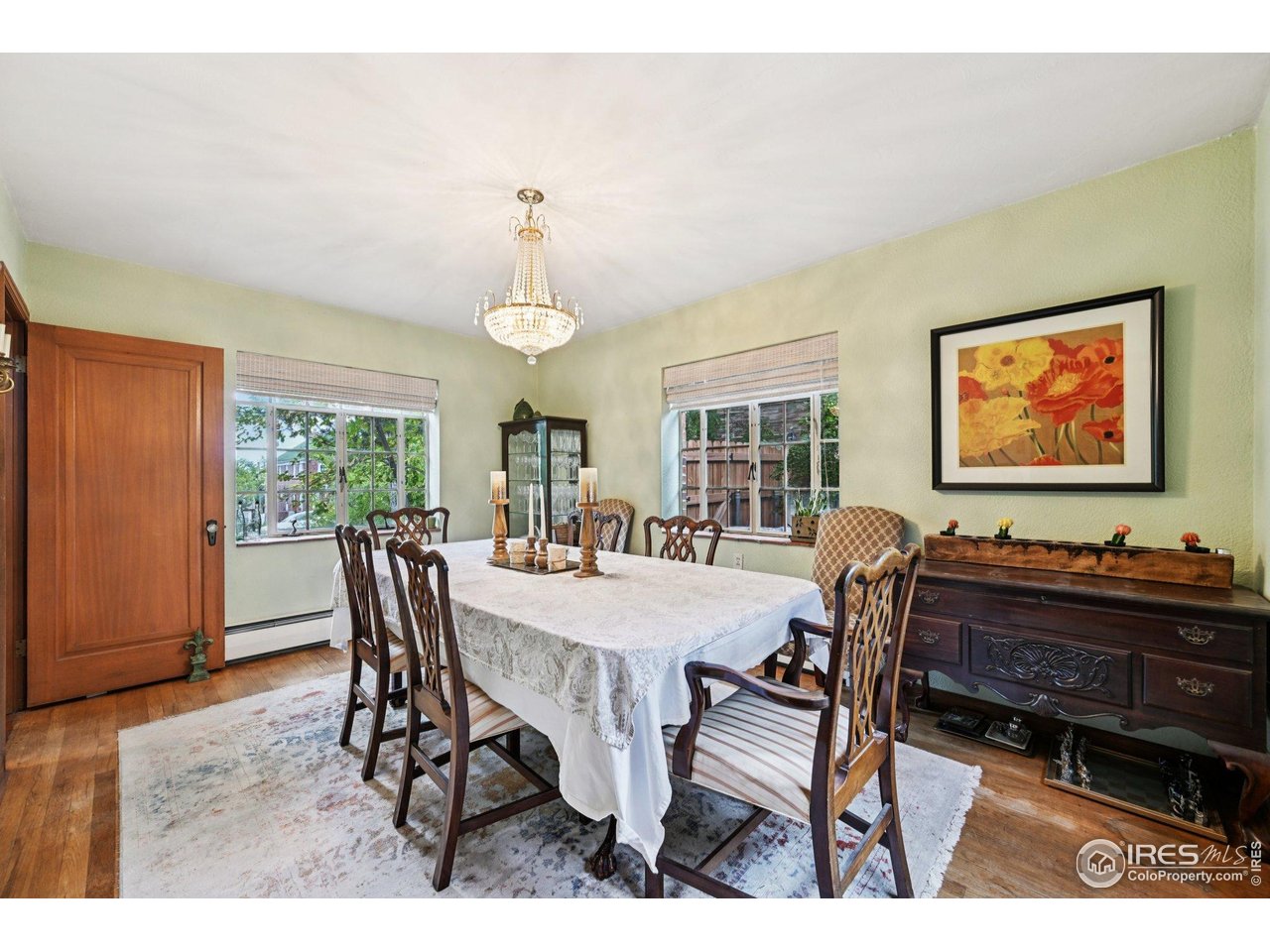 715 14th Street Boulder, CO 80302 - Photo 12 of 43 a view of a dining room with furniture window and wooden floor