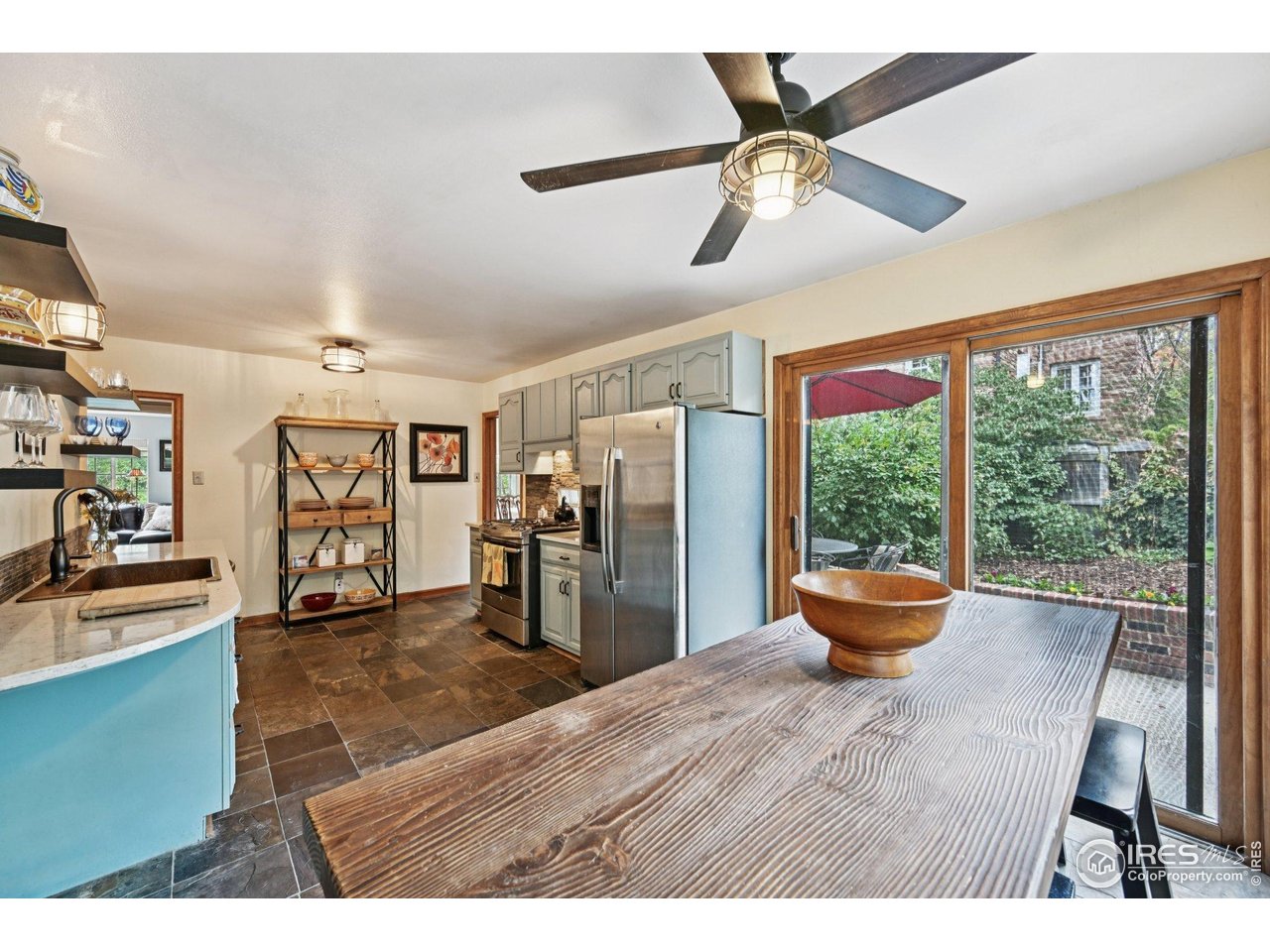 715 14th Street Boulder, CO 80302 - Photo 17 of 43 a outdoor space with wooden floor and a potted plant