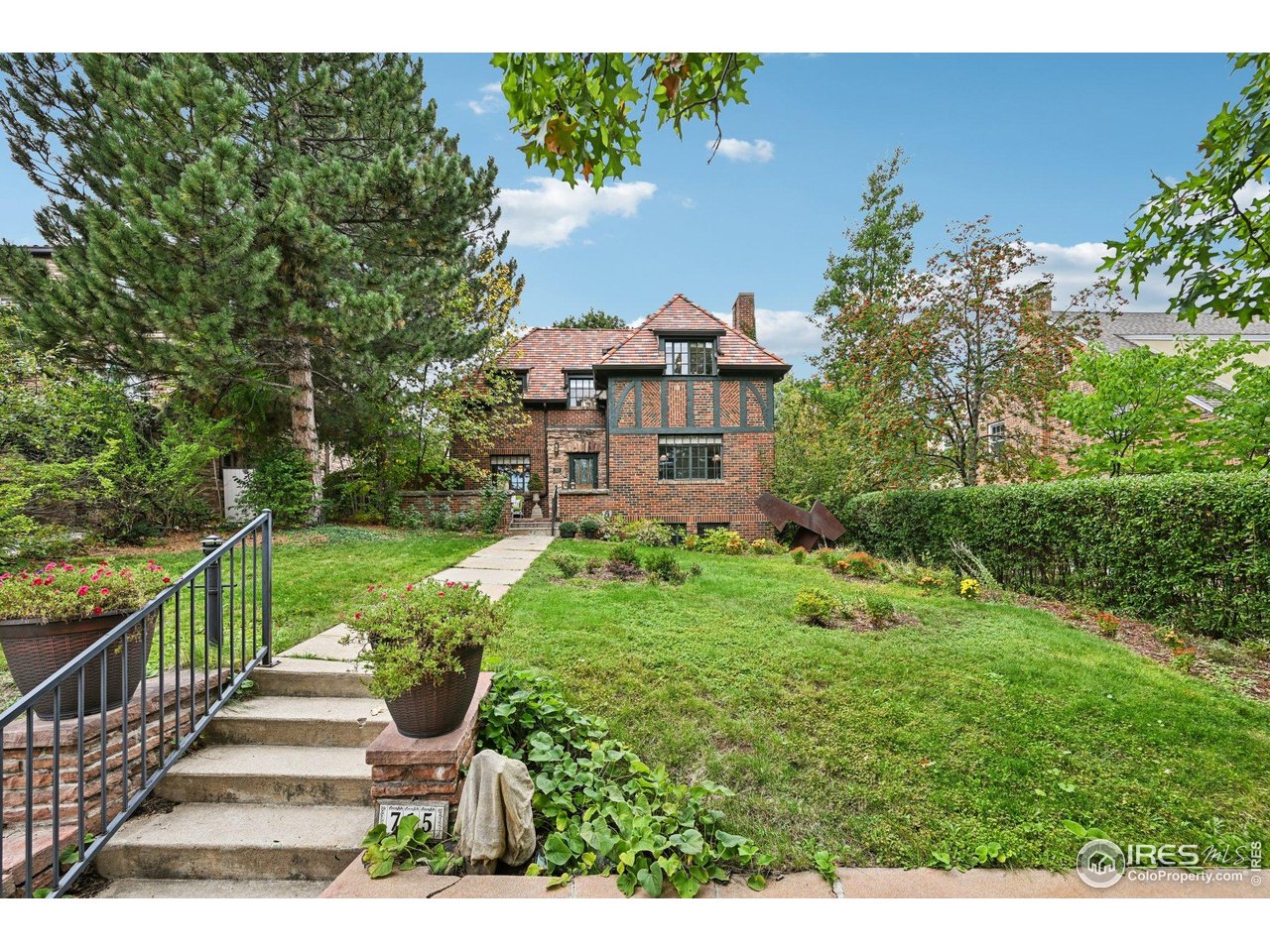715 14th Street Boulder, CO 80302 - Photo 3 of 43 a view of a garden with pathway