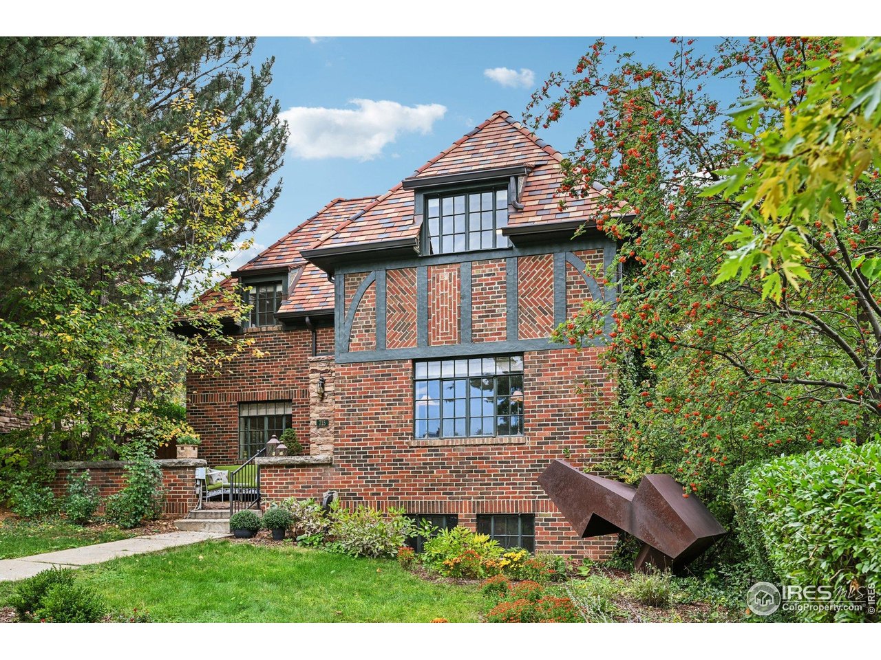 715 14th Street Boulder, CO 80302 - Photo 4 of 43 an aerial view of a house with yard and outdoor seating