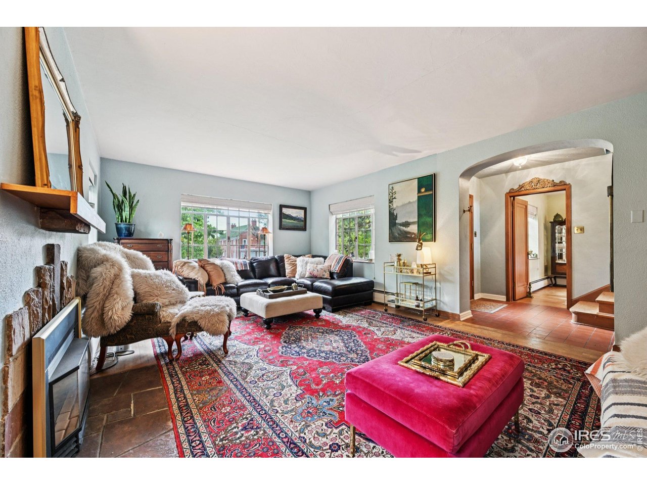 715 14th Street Boulder, CO 80302 - Photo 9 of 43 a living room with furniture a rug and a wooden floor