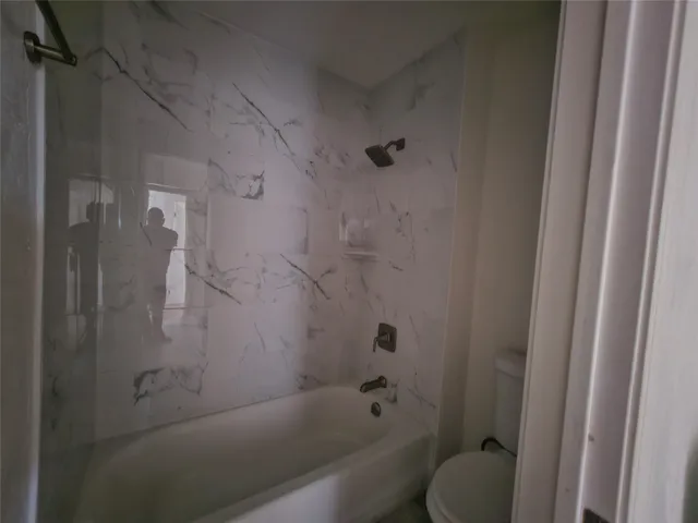 a bathroom with a bathtub