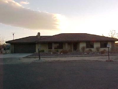 18267 Winnetka Road, Unit 3 Apple Valley, CA 92307 - Photo 1 of 1 a front view of a house