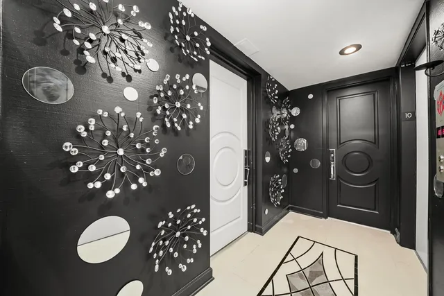 a bathroom with a sink vanity and mirror