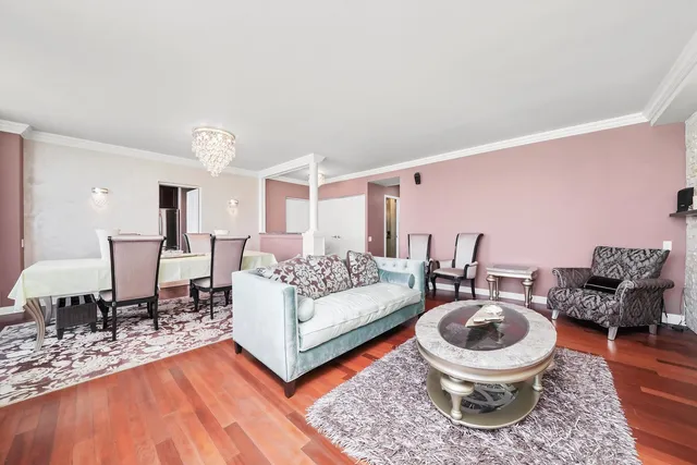 a living room with furniture and a table