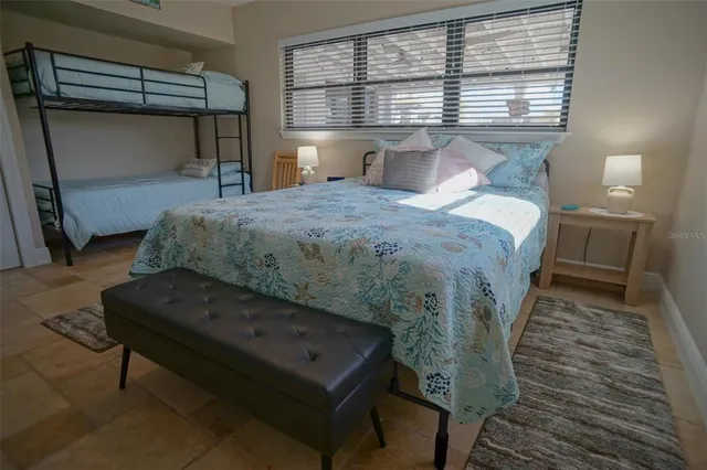 a bathroom with a sink a mirror and shower