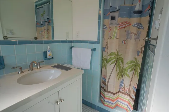 a view of water heater and covered with wooden fence