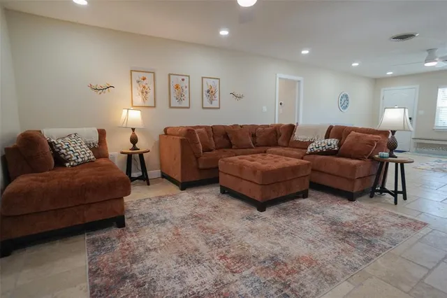 a living room with furniture and a couch