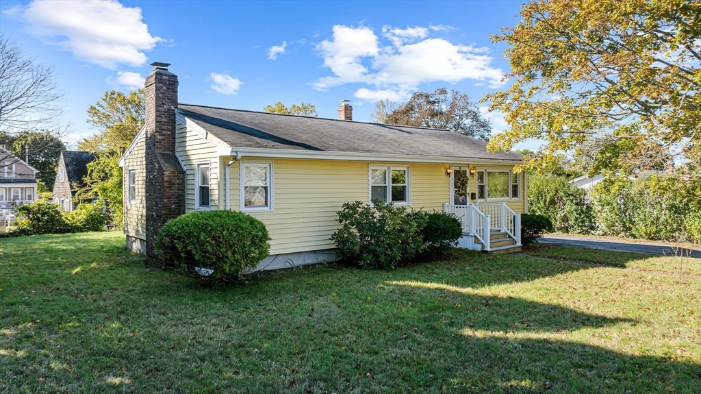 71 Harding Road Fairhaven, MA 02719 - Photo 1 of 28 a front view of a house with garden