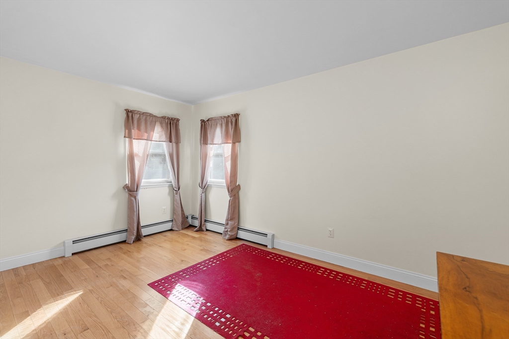 71 Harding Road Fairhaven, MA 02719 - Photo 23 of 28 a living room with a rug