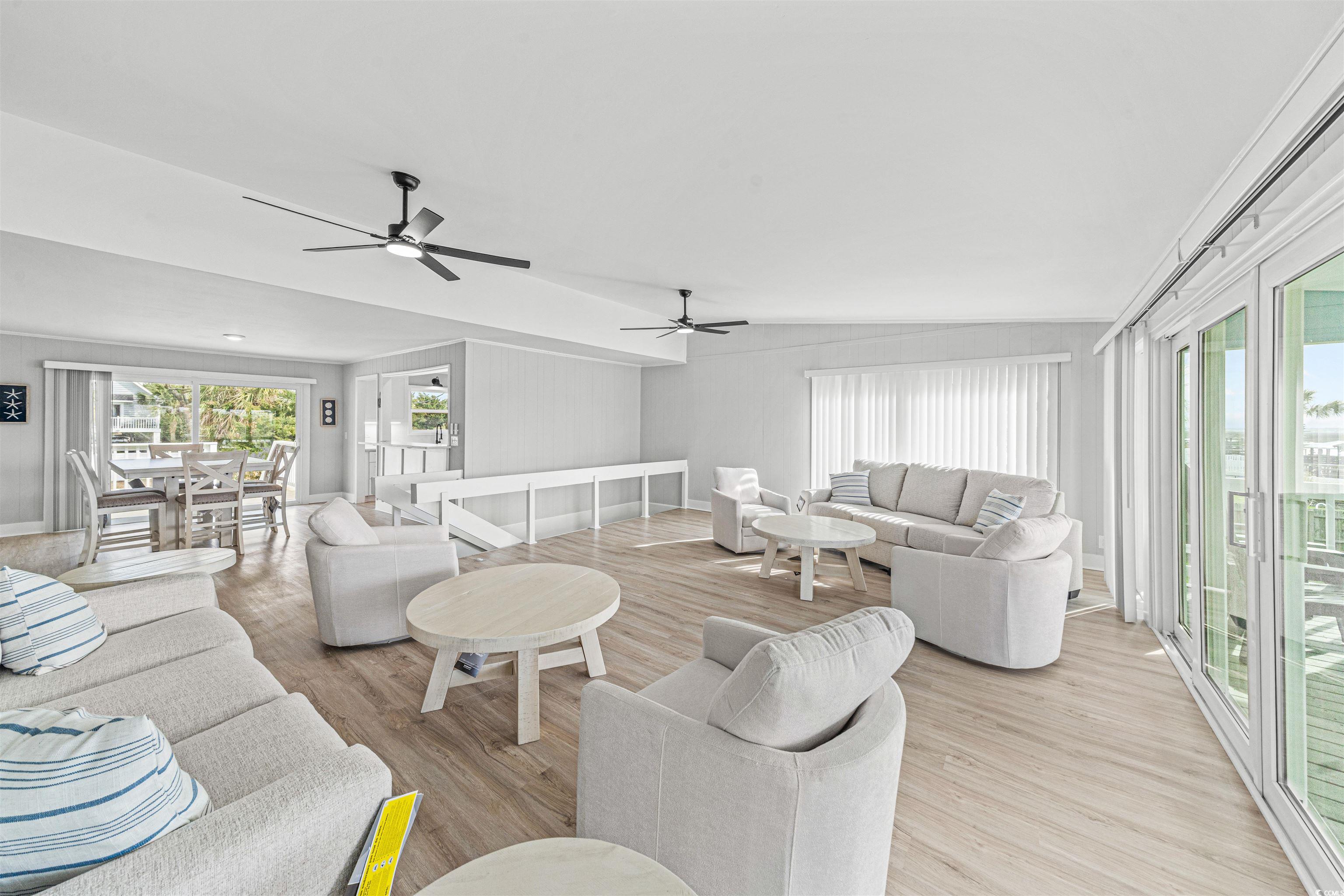 338 State Rd S-26-530 Murrells Inlet, SC 29576 - Photo 19 of 39 Living room featuring light wood-style flooring and a ceiling fan