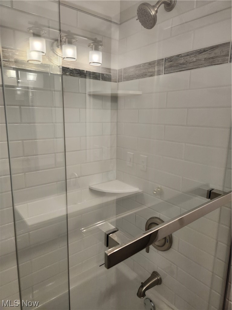 4660 West Farnhurst Road South Euclid, OH 44121 - Photo 13 of 17 Bathroom with tiled shower / bath combo