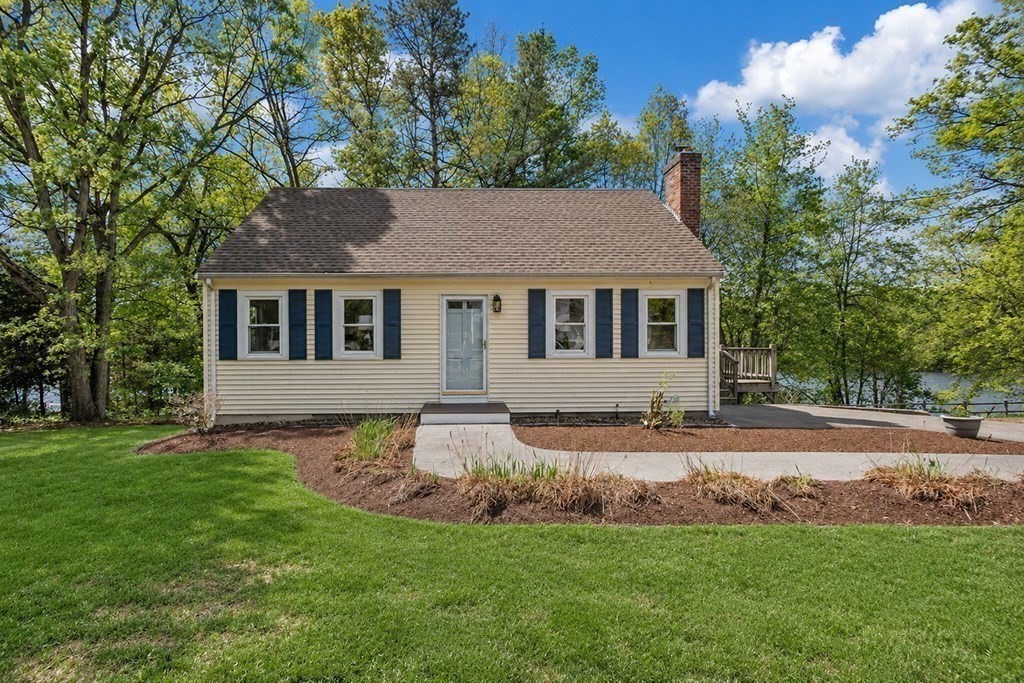 117 Oak Ridge Drive Ayer, MA 01432 - Photo 2 of 26 a house view with a garden space