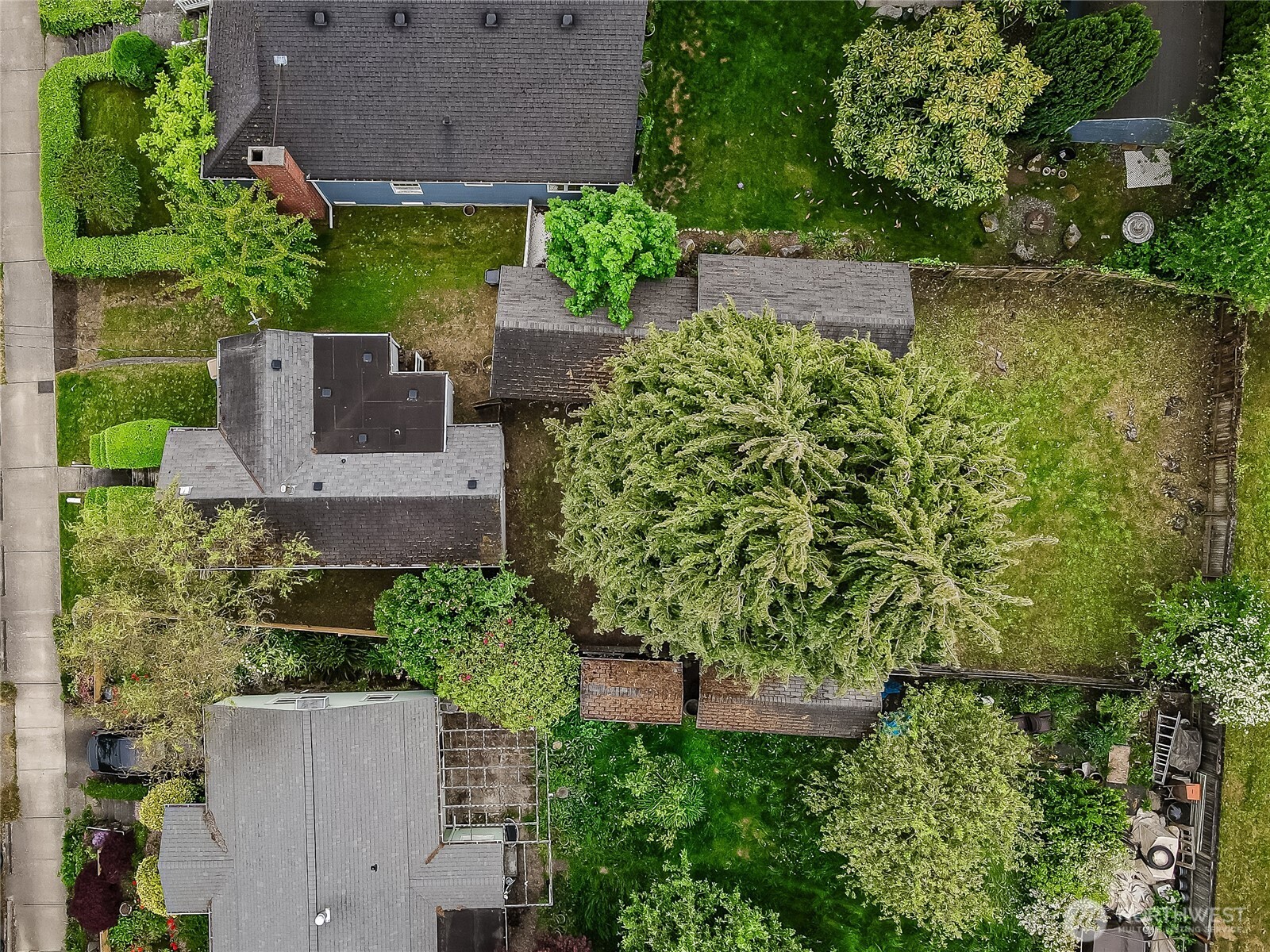9817 35th Avenue Southwest Seattle, WA 98126 - Photo 18 of 25 an aerial view of a house with a yard