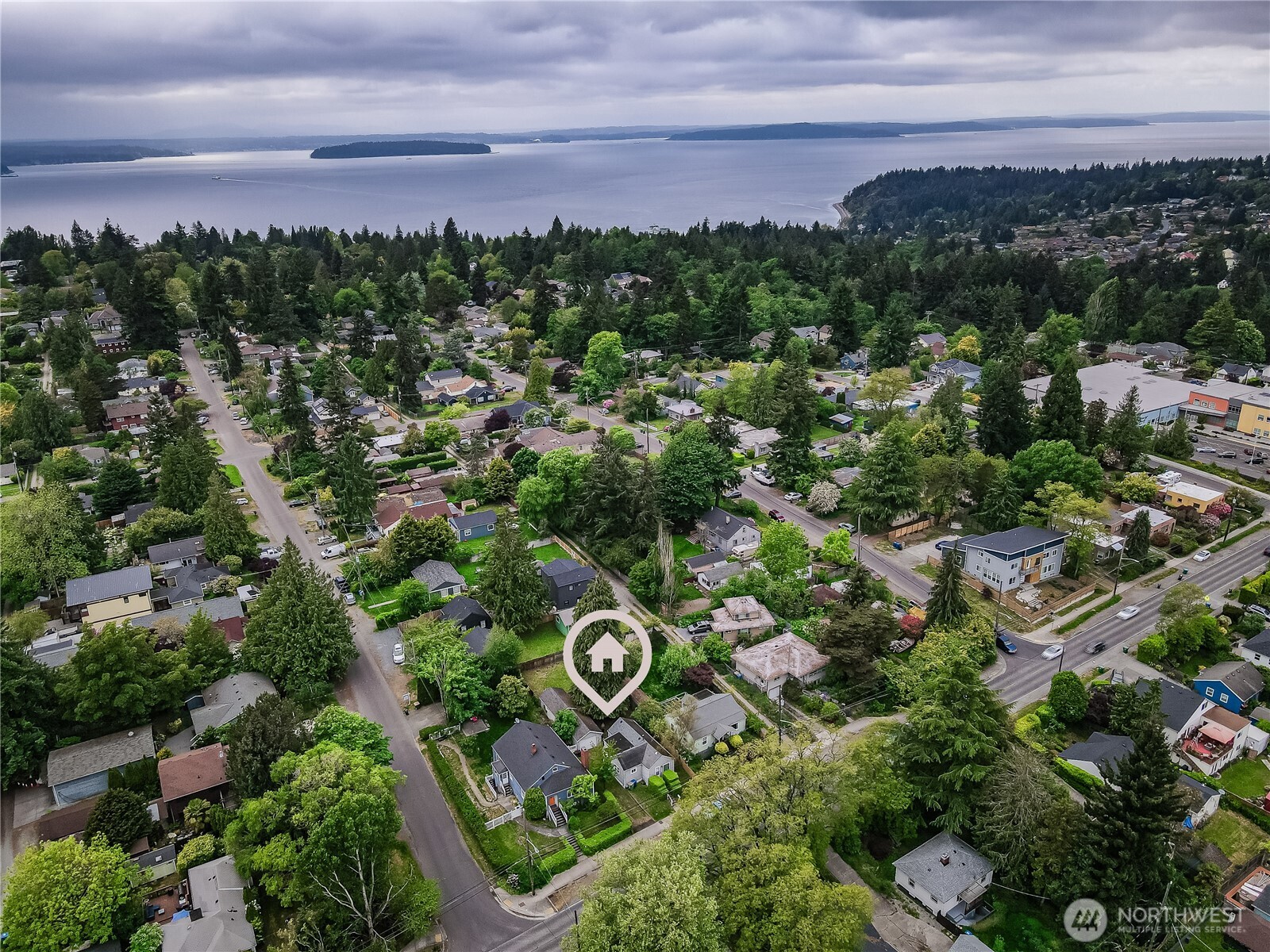 9817 35th Avenue Southwest Seattle, WA 98126 - Photo 20 of 25 an aerial view of a city and mountain view in back