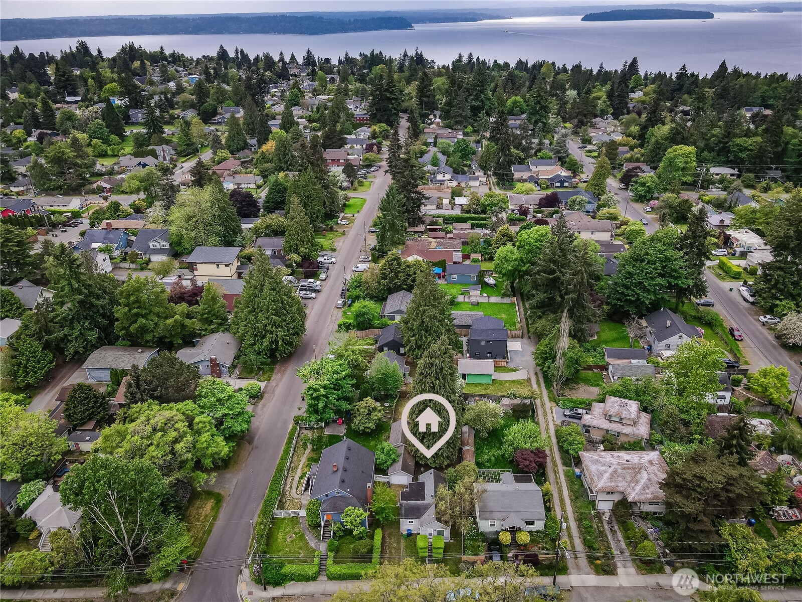 9817 35th Avenue Southwest Seattle, WA 98126 - Photo 21 of 25 an aerial view of residential house with outdoor space and swimming pool