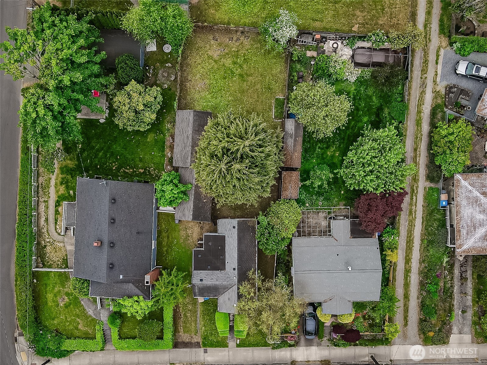 9817 35th Avenue Southwest Seattle, WA 98126 - Photo 22 of 25 an aerial view of a house with garden space and street view