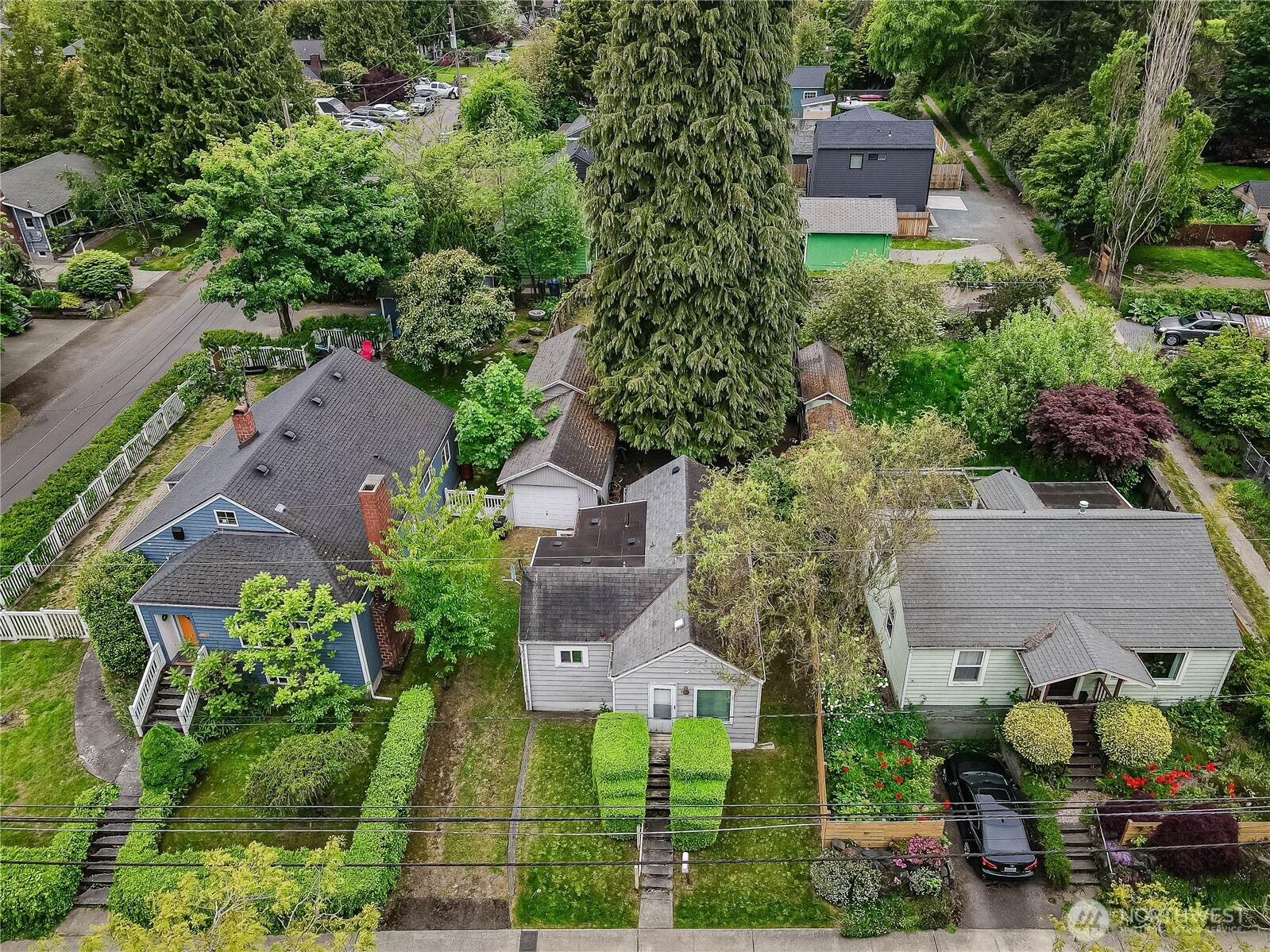 9817 35th Avenue Southwest Seattle, WA 98126 - Photo 23 of 25 an aerial view of a house with garden space and street view