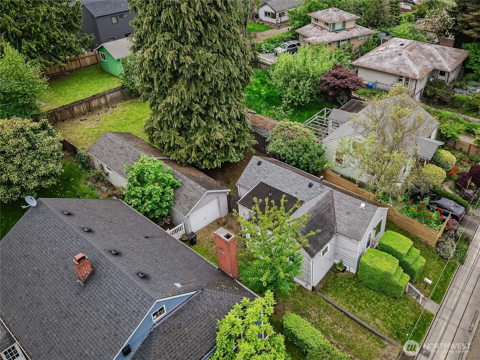 9817 35th Avenue Southwest Seattle, WA 98126 - Photo 25 of 25 an aerial view of a house with a yard