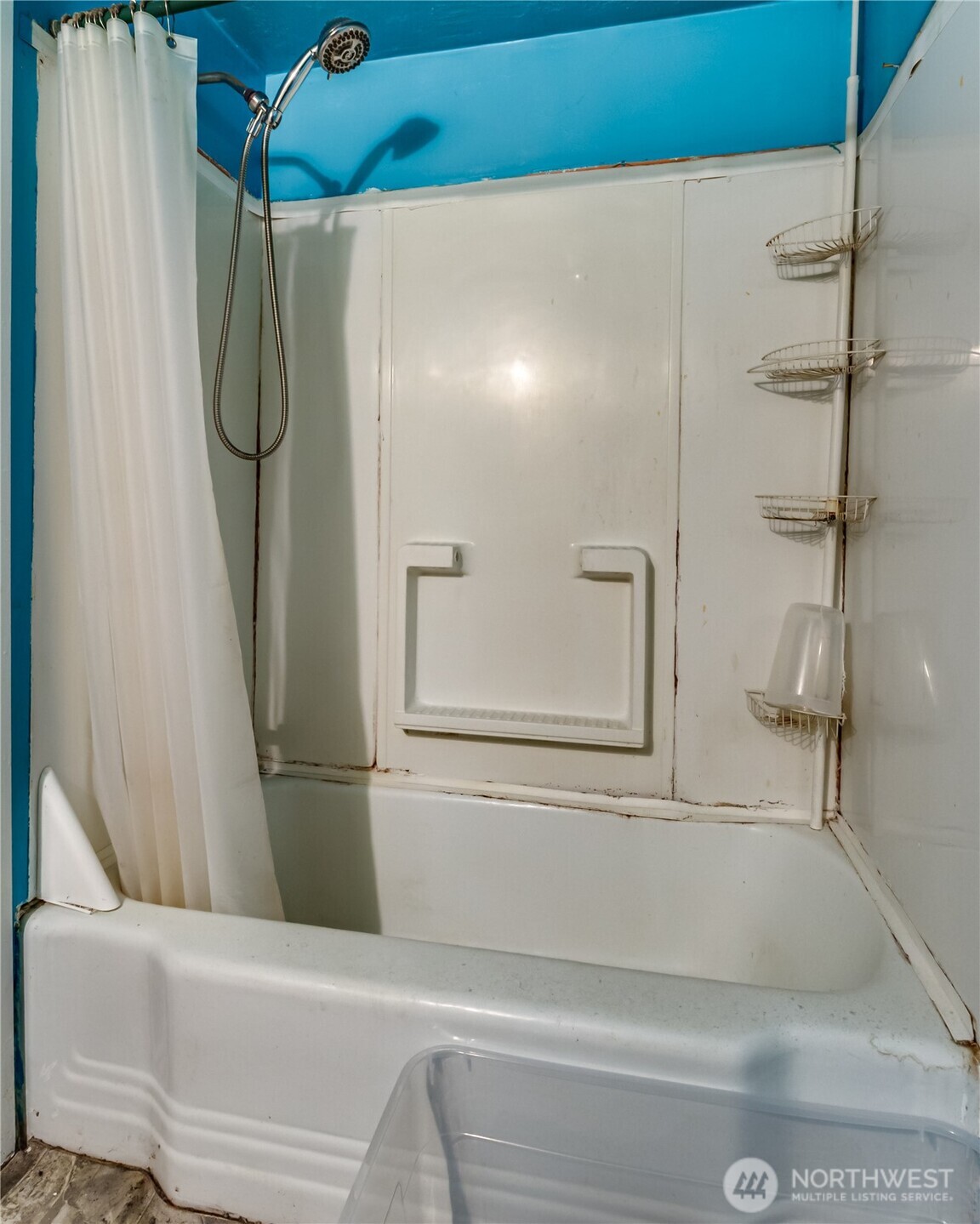 9817 35th Avenue Southwest Seattle, WA 98126 - Photo 9 of 25 a bathroom with a shower