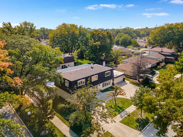 a view of a house with a mountain in the background