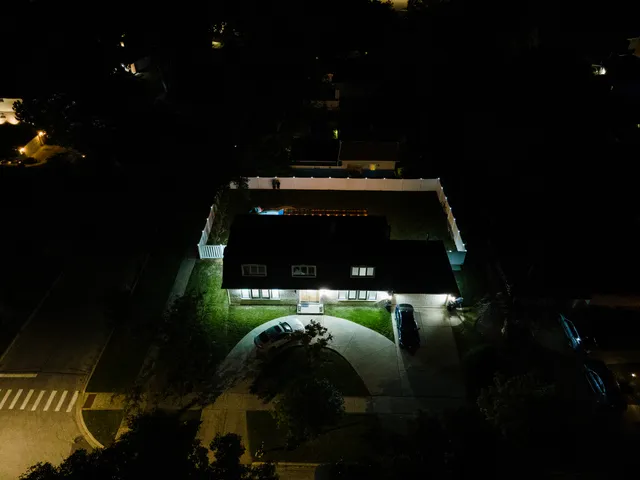 a view of a swimming pool with a patio