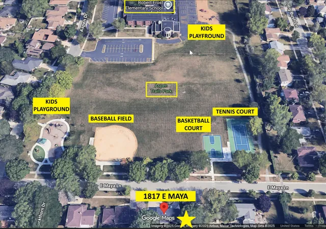 an aerial view of a house with a swimming pool yard and outdoor seating