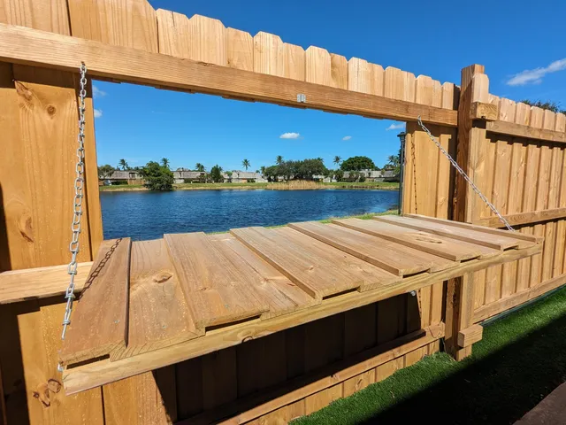 a view of balcony with furniture