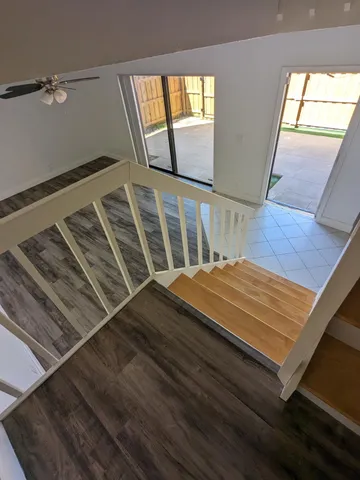 a bathroom with 2 sink and a mirror