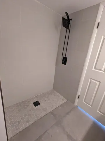 a close up view of a washer and dryer in a utility room