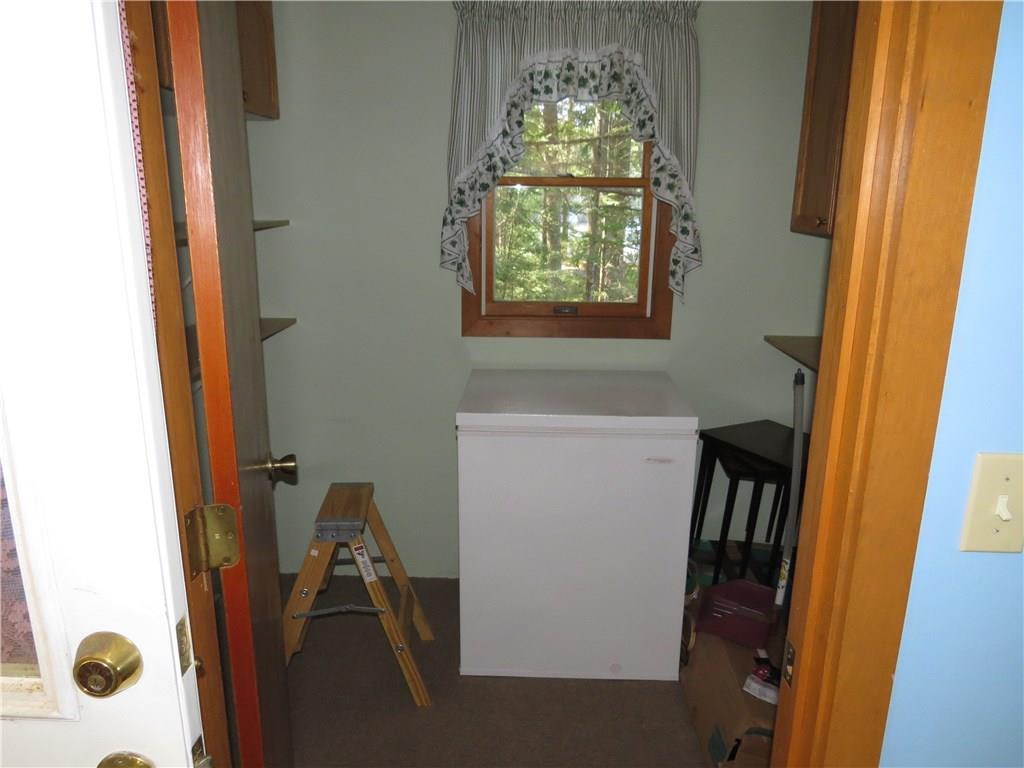 392 Pond Road Mercer, ME 04957 - Photo 15 of 25 Walk in pantry with small freezer.