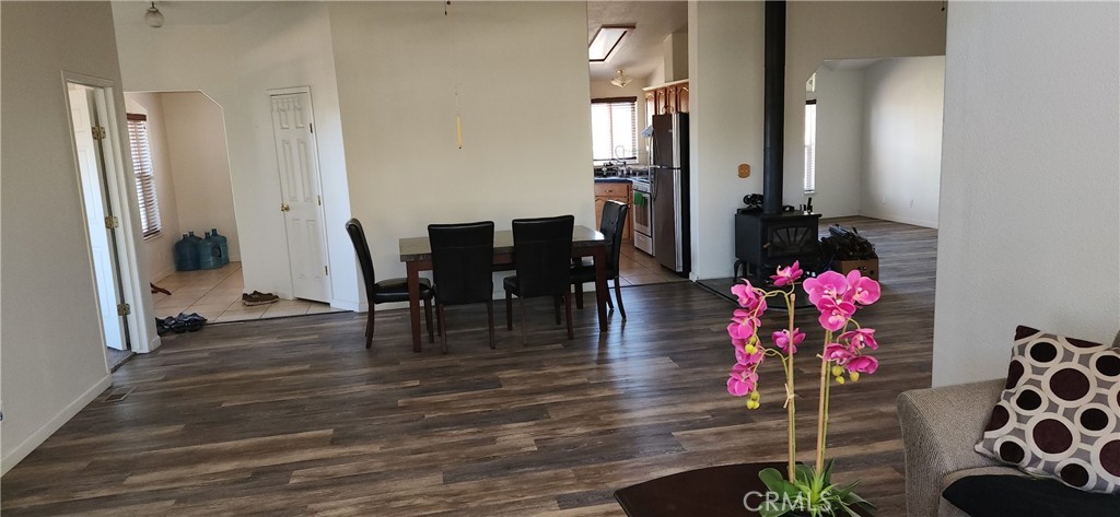 238 Elams Ranch Road Oroville, CA 95966 - Photo 18 of 75 a view of a dining room with furniture and wooden floor