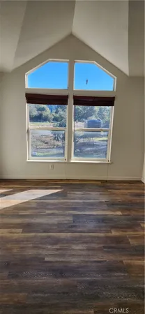 a kitchen with stainless steel appliances a refrigerator and a stove