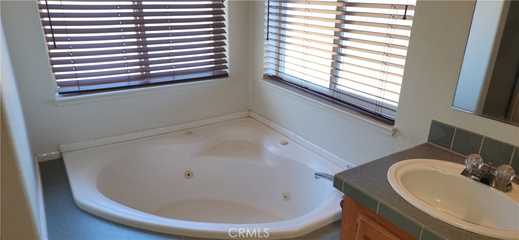 238 Elams Ranch Road Oroville, CA 95966 - Photo 33 of 75 a bathroom with a sink and a window