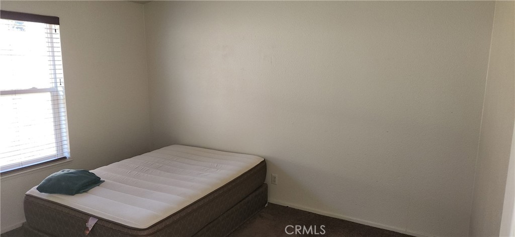 238 Elams Ranch Road Oroville, CA 95966 - Photo 37 of 75 a room with a bed and a window